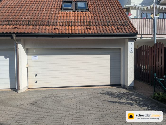 Duplexgarage zwischen Haus 48 und Haus 49